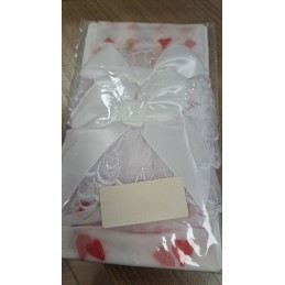 Bas blancs motifs coeurs noeuds rouges