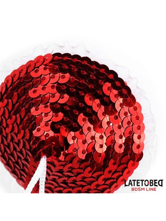 Cache-tétons à paillettes rouges et pompons blancs