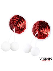 Cache-tétons à paillettes rouges et pompons blancs