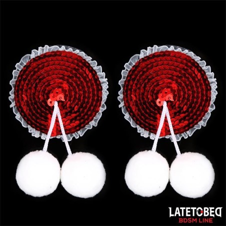 Cache-tétons à paillettes rouges et pompons blancs
